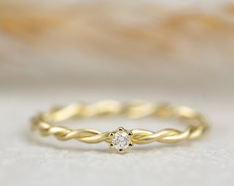 Verlobungsring " Milou " aus 585/- Gelbgold mit Krappenfassung und Diamant, Kordelring