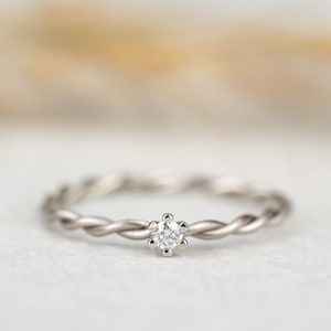 Engagement ring &quot; Milou &quot; made of 950/- platinum with claw setting and diamond, cord ring