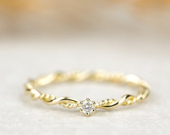 Engagement ring "Filou" made of 585/- yellow gold with prong setting and diamond, cord ring