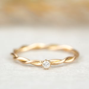 Engagement ring "Milou" made of 585/- rose gold with prong setting and diamond, cord ring