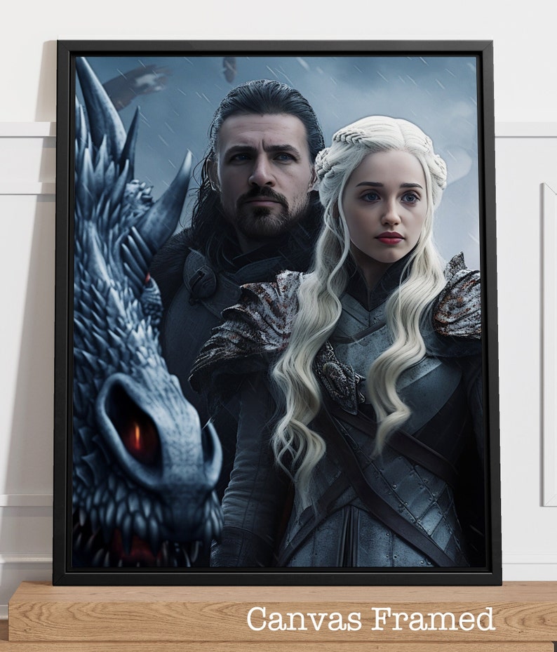 May include: Framed canvas art featuring two characters from a fantasy series, with a dragon on the left. The characters are dressed in armor, with one having long, white hair. The canvas is framed in black, with the text "Canvas Framed" at the bottom.