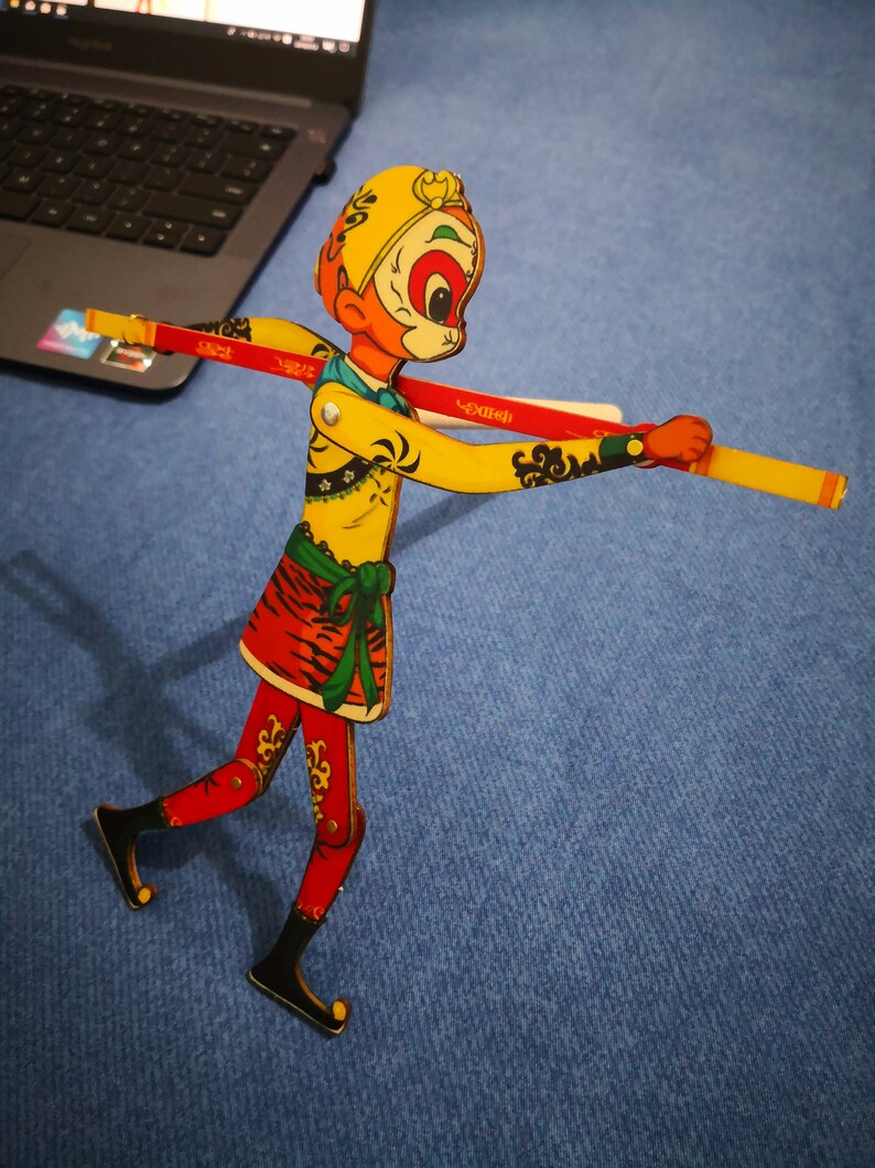 red monkey puppet