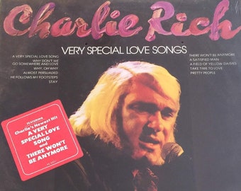 May include: A vinyl record album cover featuring Charlie Rich, a country music singer. The cover is black with a photo of Charlie Rich singing into a microphone. The album title is "Very Special Love Songs" and the album features a song called "There Won't Be Anymore".