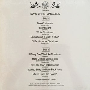 May include: A white vinyl record album cover for Elvis' Christmas Album. The cover features the album title, "Elvis' Christmas Album", and a list of songs on each side of the record. The album is from the Special Music label and has the catalogue number CAS-2428.