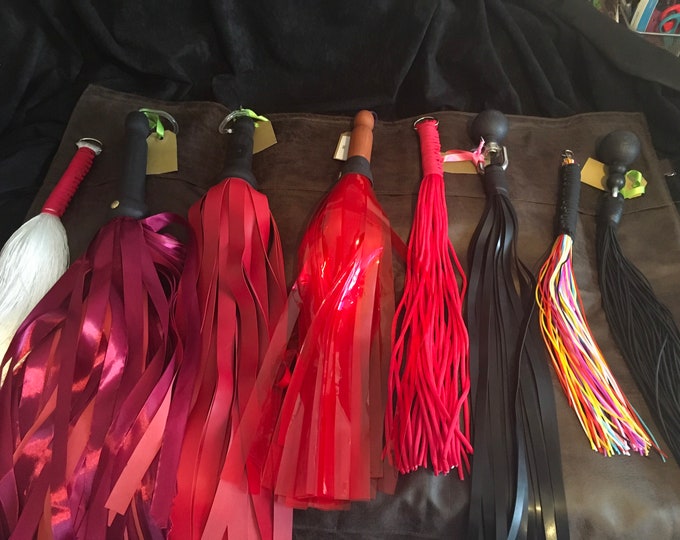 Dungeon, Master or Mistress Set of 8 Floggers & Storage Bag.