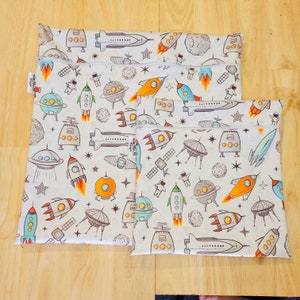 Sacs humides/nageurs réutilisables personnalisés et peuvent remplacer les sacs à fermeture éclair, tissu imperméable pour enfants brillants, astronaute de plage imperméable pour bébé