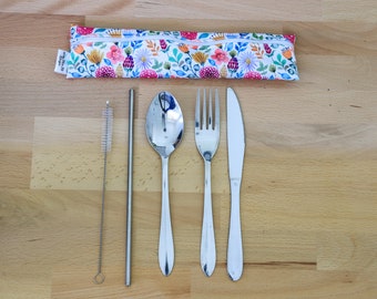 May include: A floral patterned zippered pouch containing a stainless steel spoon, fork, knife, and straw with a cleaning brush.