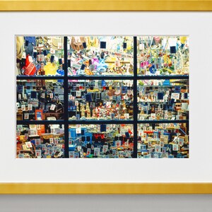 May include: A shop window display filled with a variety of colourful items, including toys, trinkets, and other small goods. The window is divided into nine sections, each filled with different items. The items are all tagged with price labels.