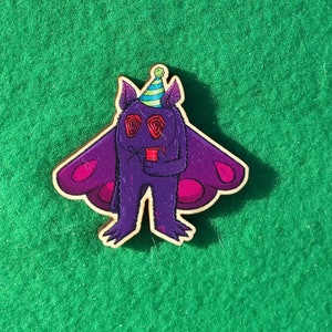 Party Time Mothman Cryptid 40mm Wooden Pin with rubber clutch
