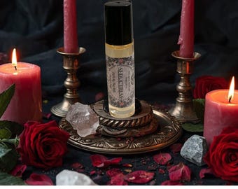 SEDUCTRESS: Pheromone Perfume Oil- Crystal Infused-Reiki charged-Attract Love