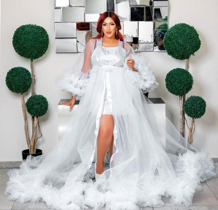 white robe with fur trim