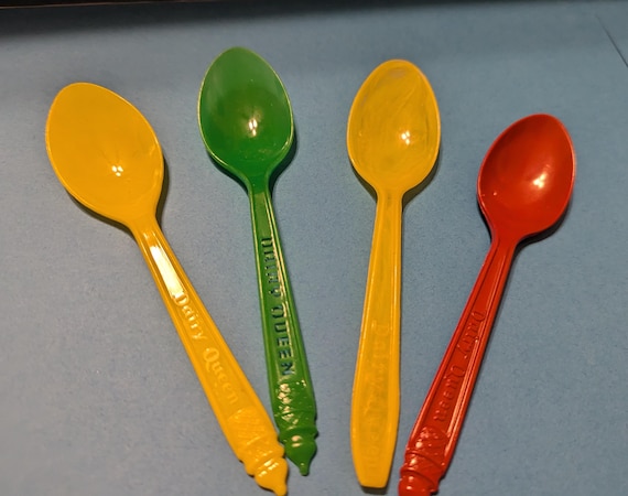 Four Vintage Dairy Queen Spoons. Two Yellow, One Red, and One