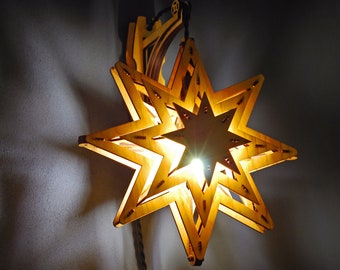 Scandinavian welcome star plug in wall sconce. Wall light fixture in Lagom, Hygge or Koselig style. Swedish decor star light