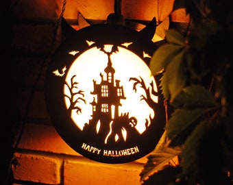 Halloween decorations lantern.  Indoor, outdoor wall and window Halloween decor. Haunted House pendant light. Happy Halloween light up sign.