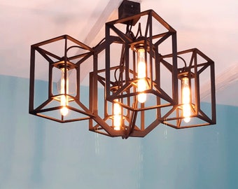 Moderne boerderij kroonluchter met grote 4 lamp rechthoekige houten hanglampen. Eigentijdse moderne kooilamp. Scandinavisch licht