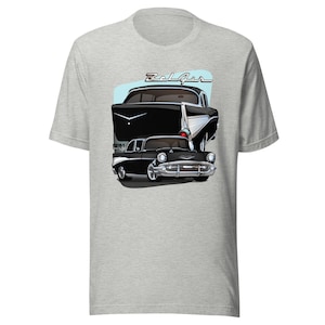 May include: A grey t-shirt with a black and white illustration of a 1957 Chevrolet Bel Air. The text "Bel Air" is printed above the car.