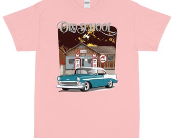 May include: A pink t-shirt featuring a vintage car illustration and the text "Old School" in a silver font. The car is blue and white and is parked in front of a petrol station.