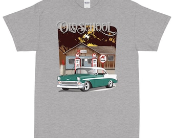 May include: A grey t-shirt featuring a vintage green car parked in front of a petrol station with the text "Old School" above the car.