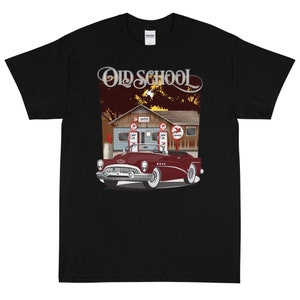 May include: A black t-shirt with a vintage car illustration and the text "Old School". The car is red and white and is parked in front of a gas station.