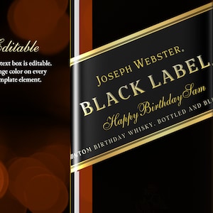 May include: A black and gold label with the text "JOSEPH WEBSTER. BLACK LABEL Happy Birthday Sam CUSTOM BIRTHDAY WHISKY. BOTTLED AND BLEND"