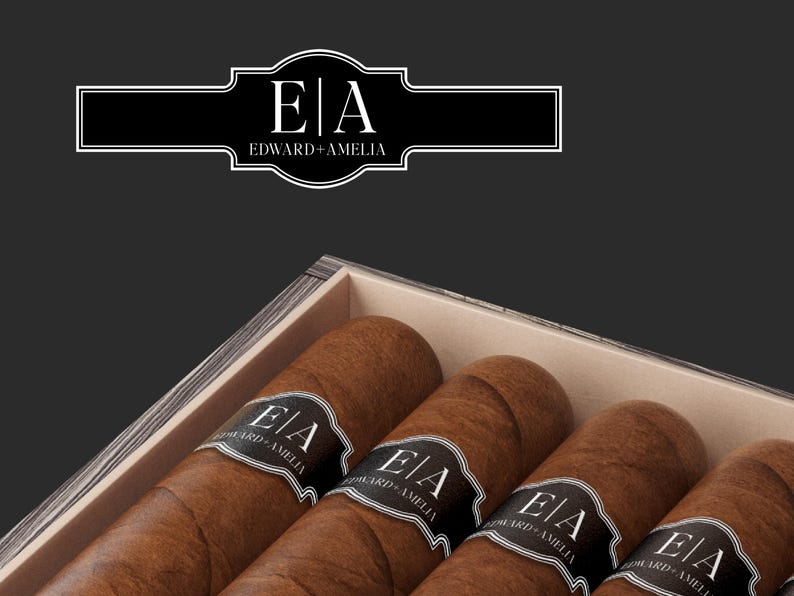 May include: A wooden box filled with five brown cigars. Each cigar has a white label with the text 'E|A EDWARD+AMELIA'.
