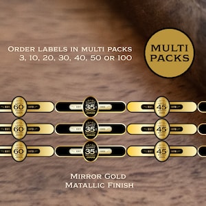 Multiple packs of gold cigar bands.