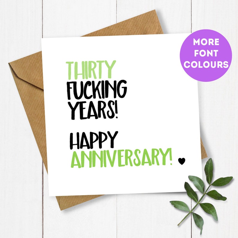 May include: A white card with green and black text that reads "Thirty Fucking Years! Happy Anniversary!" with a small heart symbol.