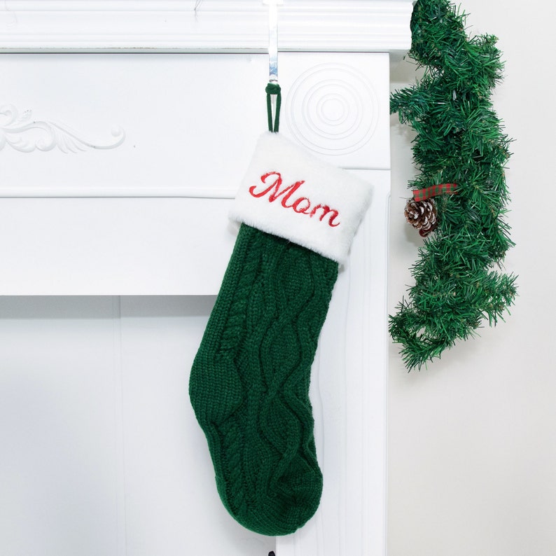 personalized green Christmas stocking for holiday home decoration.