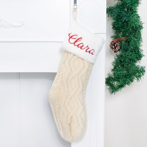 personalized white Christmas stocking for holiday home decoration.