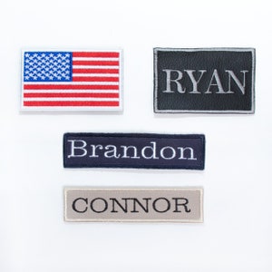 May include: Four embroidered patches, two with names, one with the American flag, and one with a black background. The names are "Ryan", "Brandon", and "Connor".