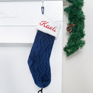 personalized blue Christmas stocking for holiday home decoration.