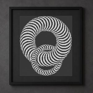 May include: A framed cross-stitch pattern featuring a black and white optical illusion design of two interlocking rings. The graphic consists of repeating curved lines that create a three-dimensional effect against a dark gray background.