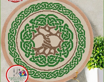 May include: Counted cross stitch pattern for instant download #86, Tree of Life.  The pattern features a green Celtic knot design with a brown tree in the center.  The pattern is 9 x 9.2 inches, 23.14 x 23.42 cm, and 164 w x 166 h stitches.  The pattern is for use with 18 count Aida fabric and DMC floss.  The pattern requires 2 colors of floss.