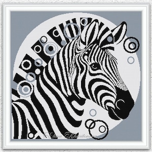 May include: Black and white zebra head illustration with a geometric design. The artwork features a zebra's head with bold stripes, set against a gray background with abstract shapes. The text "INSTANT DOWNLOAD PDF" is at the bottom.