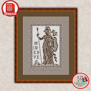 May include: A cross-stitch pattern featuring a black and white illustration of the Roman goddess Minerva, with the text "MINERVE" written below her. The pattern is framed in a brown frame with a white mat.