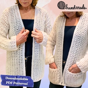 May include: Off-white, open-front crochet cardigan with long sleeves and two front pockets. The cardigan is worn over a dark top and jeans. The image includes the text "Downloadable PDF Patterns!" and a logo that says "handmade".