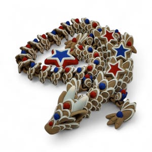 May include: A brown dragon sculpture with red, white, and blue accents. The dragon is decorated with star shapes and round embellishments. The sculpture is made of multiple pieces and has a detailed design.