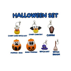 May include: A set of Halloween-themed keychains featuring a variety of spooky characters and objects, including a witch hat, a broom, a pumpkin, a ghost, a bat, a candy corn, and a coffin. The keychains are made of colorful plastic and have a fun, whimsical design.