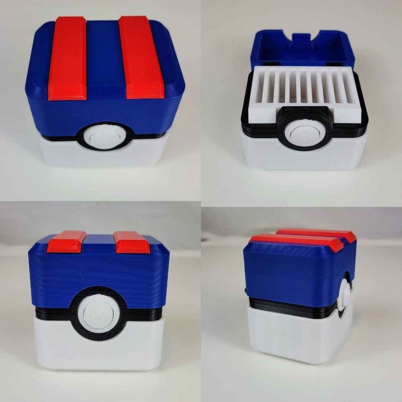 May include: A blue and red Pokemon card storage box with a white base and a Pokeball design. The box is open to reveal a compartment with slots for holding cards.