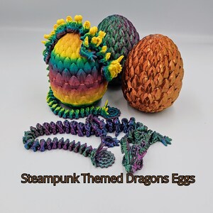 May include: Three dragon eggs, one with a rainbow iridescent finish, one with a green iridescent finish, and one with a copper iridescent finish. A steampunk dragon chain with a dragon head charm is also pictured.  Steampunk Themed Dragons Eggs