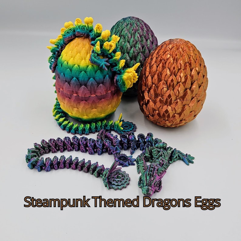 May include: Three dragon eggs, one with a rainbow iridescent finish, one with a green iridescent finish, and one with a copper iridescent finish. A steampunk dragon chain with a dragon head charm is also pictured.  Steampunk Themed Dragons Eggs