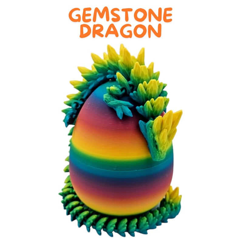 May include: A rainbow-colored dragon egg with a green and yellow dragon curled around it. The dragon has a spiky crest and tail.