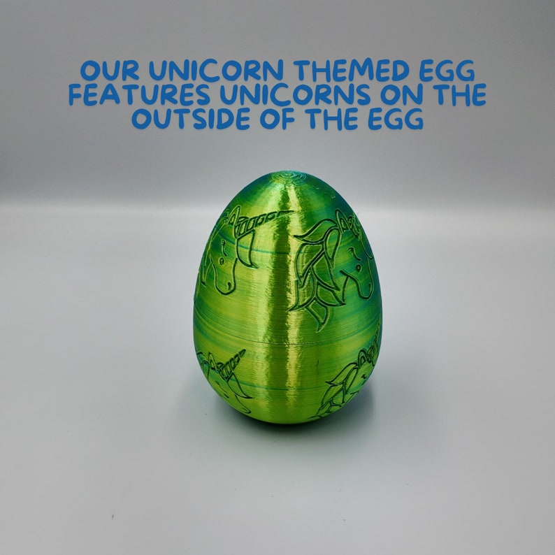 May include: A green and blue egg-shaped object with a unicorn design. The egg is decorated with multiple unicorn silhouettes.
