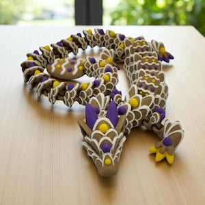 May include: A whimsical, brown dragon sculpture with intricate details. The dragon features a segmented body with white, yellow, and purple accents. The head and tail are also detailed with the same color scheme, creating a unique and artistic piece.