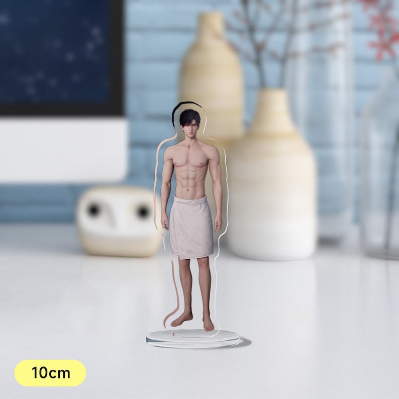 May include: A clear acrylic figurine of a person wearing a white towel. The figurine is 10 cm tall.