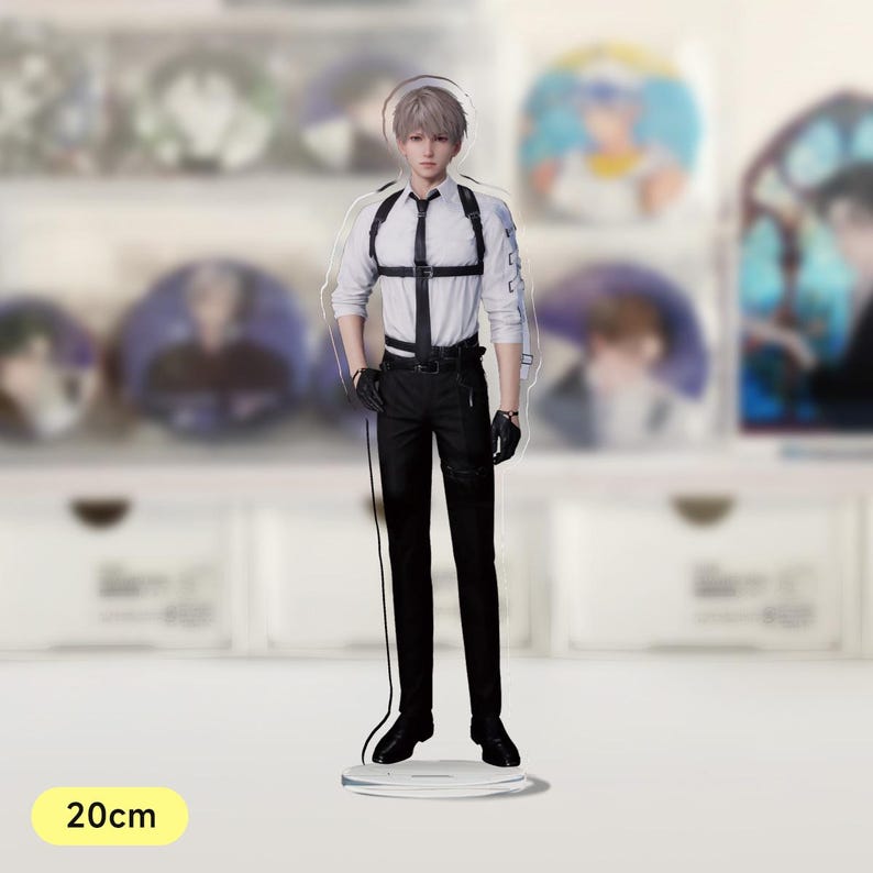 May include: A white and black anime character figurine standing on a clear acrylic base. The character is wearing a white shirt with a black harness, black trousers, and black gloves. The figurine is 20 cm tall.