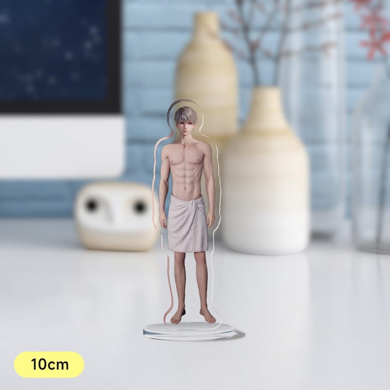 May include: A clear acrylic figurine of a person standing with a white towel wrapped around their waist. The figurine is 10 cm tall.