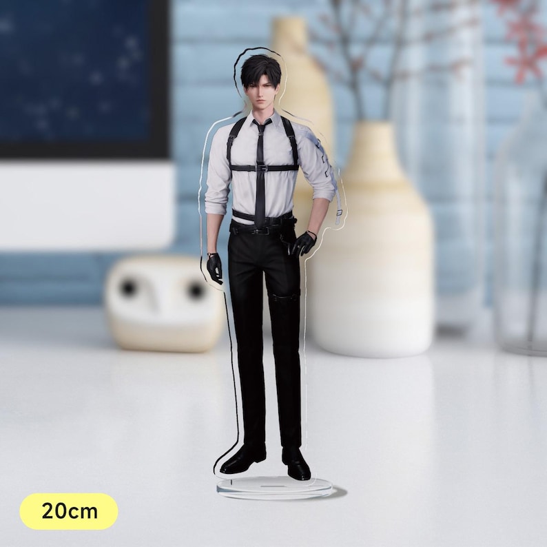 May include: A black and white anime-style character figurine standing on a clear acrylic base. The character is wearing a white shirt, black trousers, and a black harness. The figurine is 20 cm tall.