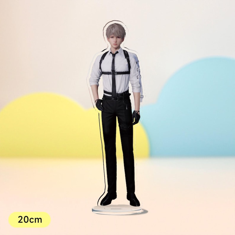 May include: An acrylic figure of a person wearing a white shirt, black trousers, and a black harness. The figure is standing on a clear acrylic base. The figure is 20 cm tall.