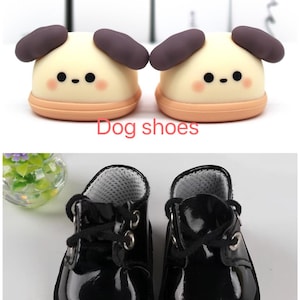 K&ouml;nnte beinhalten: Zwei Paar Hundeschuhe. Das obere Paar hat die Form eines Cartoon-Hundes mit braunen Ohren und einer pfirsichfarbenen Basis. Das untere Paar ist schwarz, gl&auml;nzend und hat Schn&uuml;rsenkel. Der Text "Dog shoes" und "Black shoes" ist sichtbar.